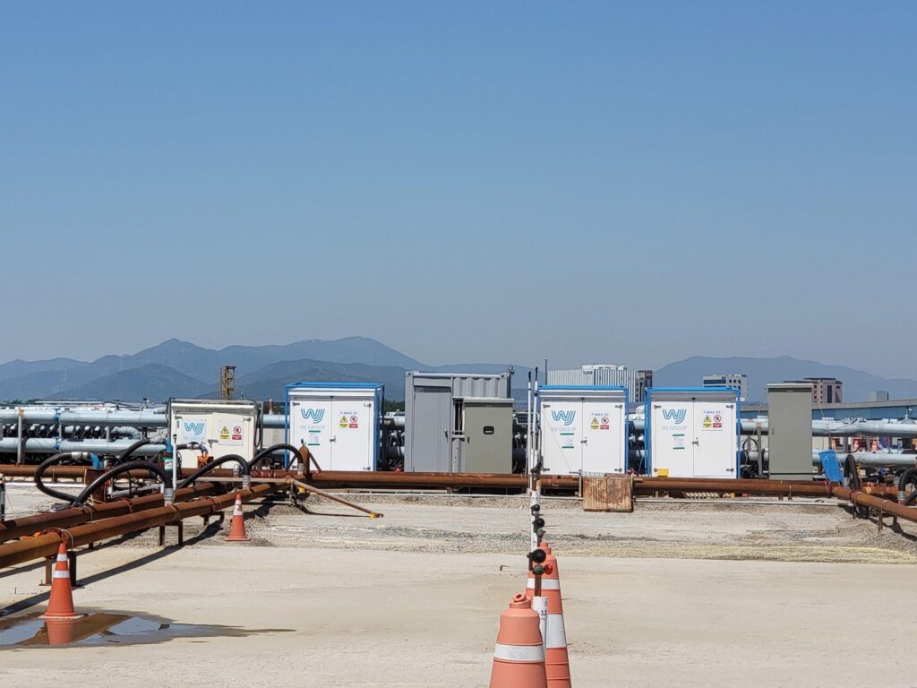 Industrial site with storage containers and pipes