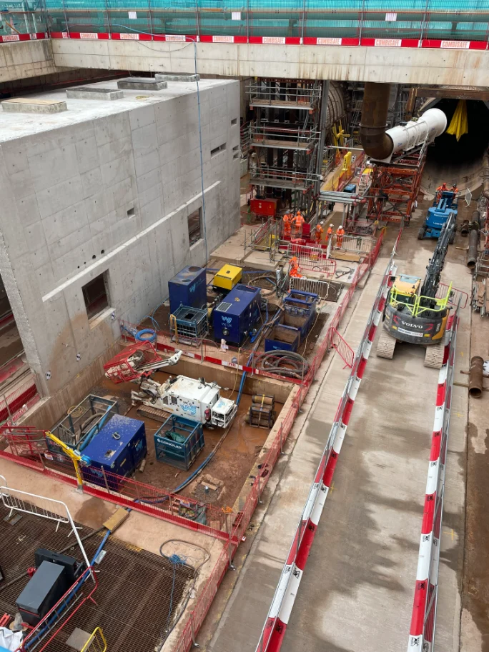 Construction site with machinery and workers. Bromford Tunnel.