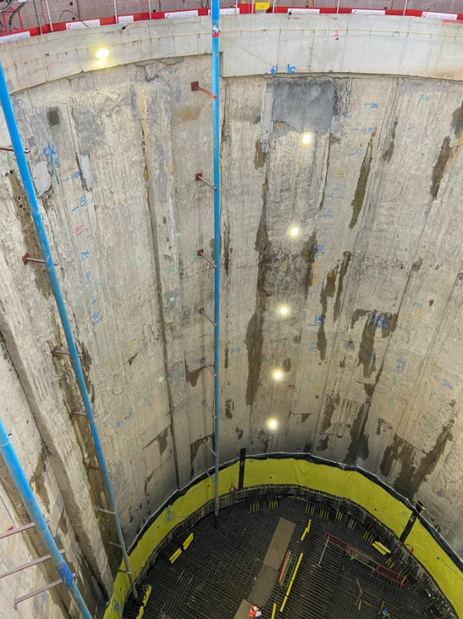 Deep construction site with lighting. Northolt Tunnel Shafts - dewatering